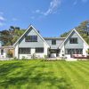 Balancing Aesthetics and Performance: Choosing Roofing and Windows for Custom Builds