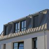 The Lifetime Exterior Upgrade: How Standing Seam Metal Roofs and Vinyl Frame Windows Eliminate Maintenance for Good