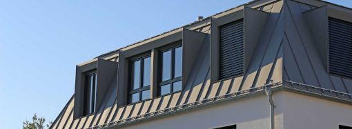 The Lifetime Exterior Upgrade: How Standing Seam Metal Roofs and Vinyl Frame Windows Eliminate Maintenance for Good
